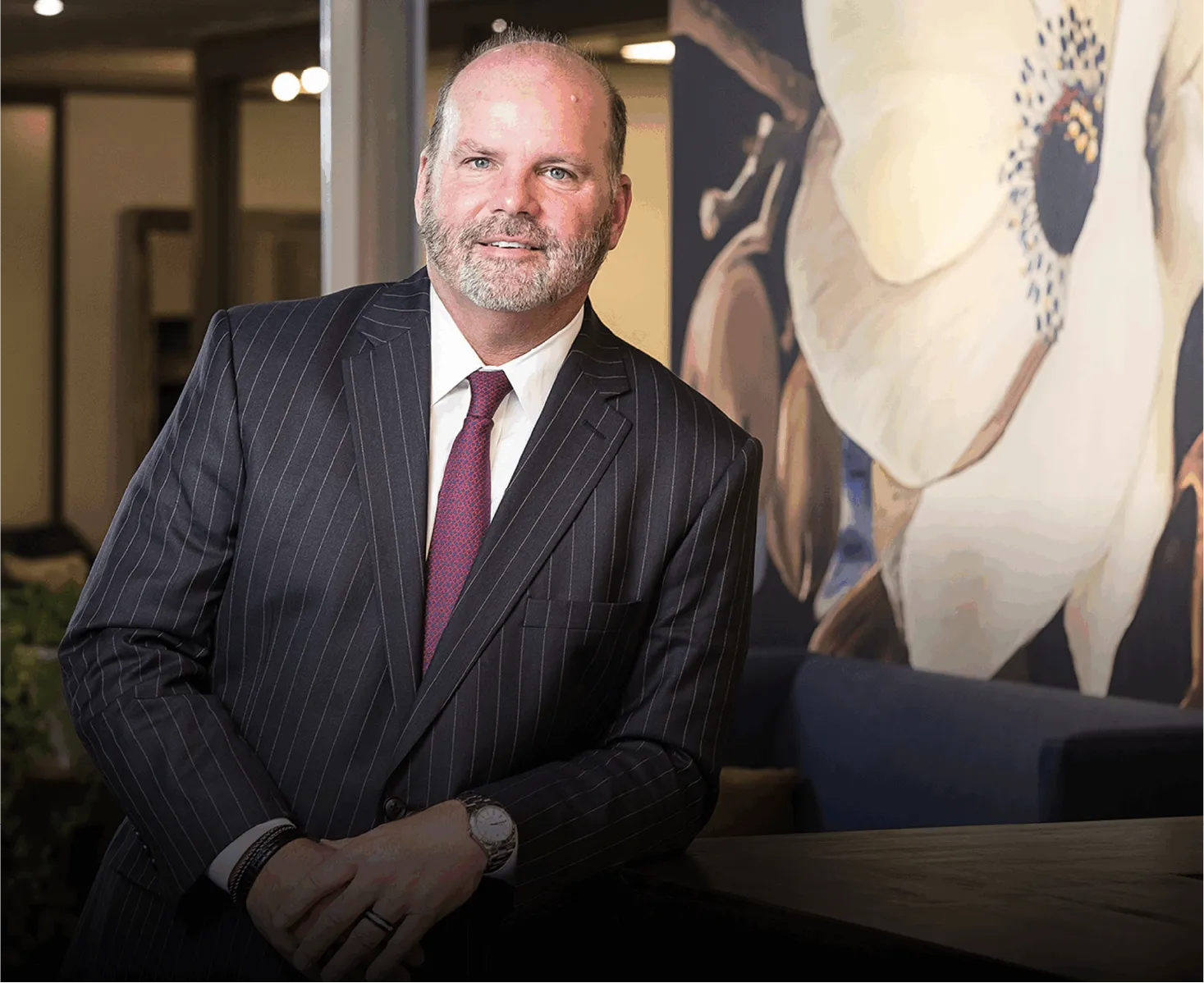 why-it-matters Cooper Elliott attorney standing in office, representing commitment to safer communities